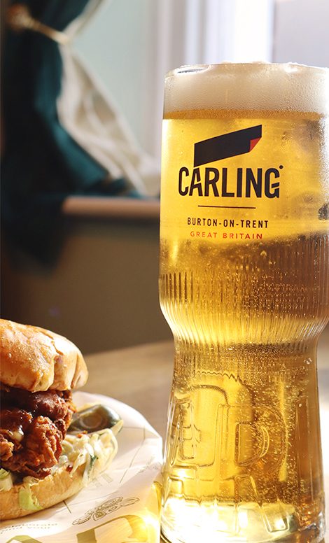 A pint with a burger